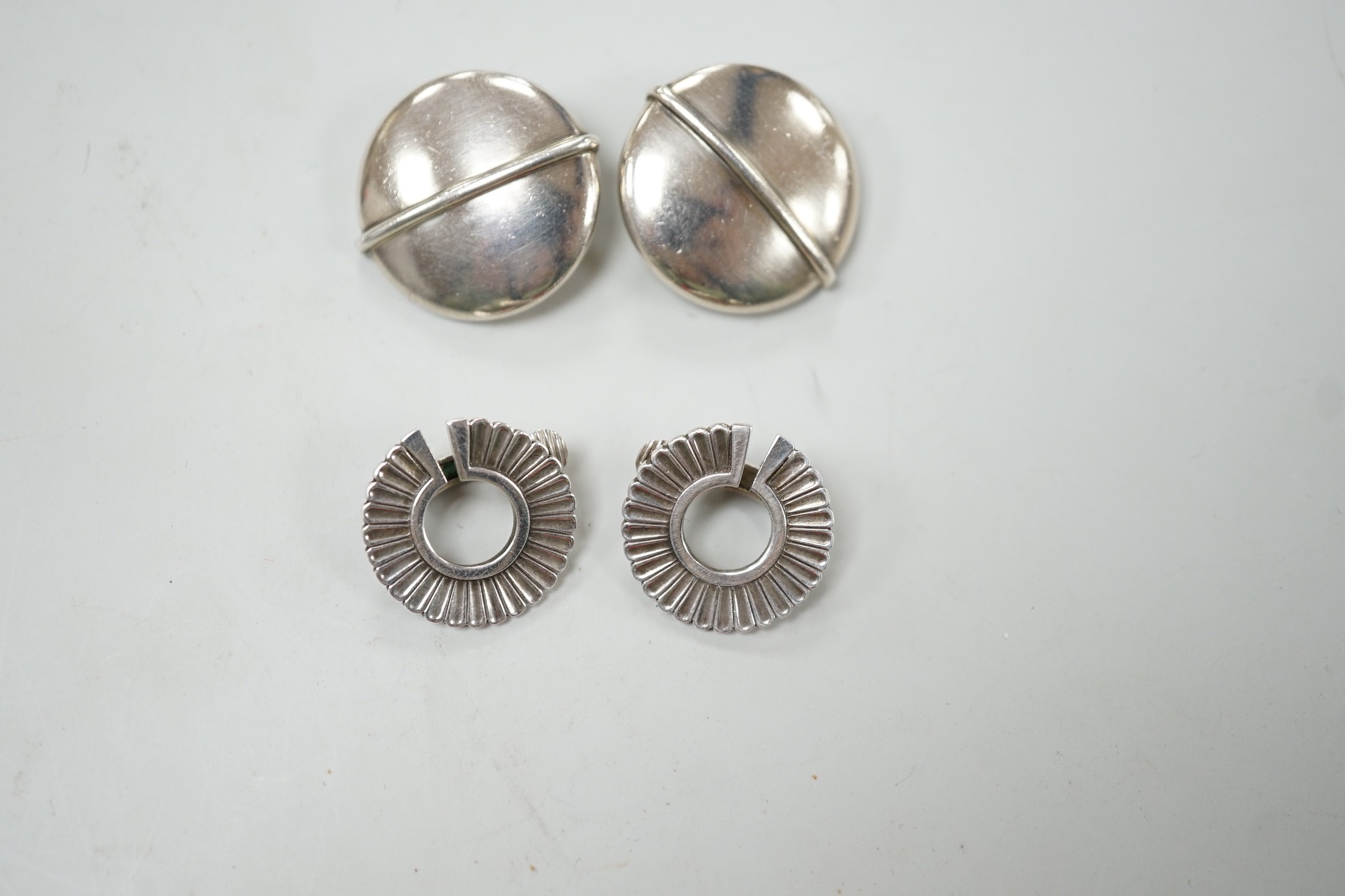 Two pairs of Georg Jensen sterling ear clips, design no. 232, 24mm and no. 92, with one Jensen box.